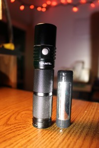 The Neutron 2C next to a 18650 battery